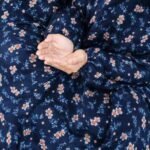 Young girl wearing a soft, breathable kids namaz chadar with comfortable sleeves, ideal for children offering namaz. BY CLOTHIFYDOTPK