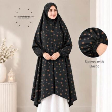 A woman standing for Salah comfortably in a breathable, soft Swiss lawn Namaz Chadar with sleeves- available at CLOTHIFYDOTPK