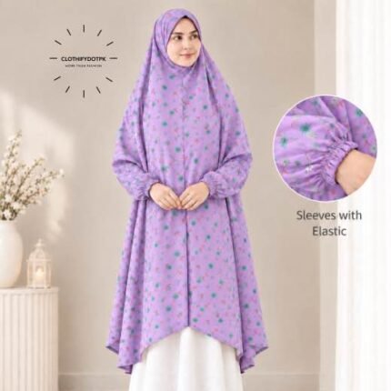 A woman standing for Salah comfortably in a breathable, soft Swiss lawn Namaz Chadar with sleeves- available at CLOTHIFYDOTPK