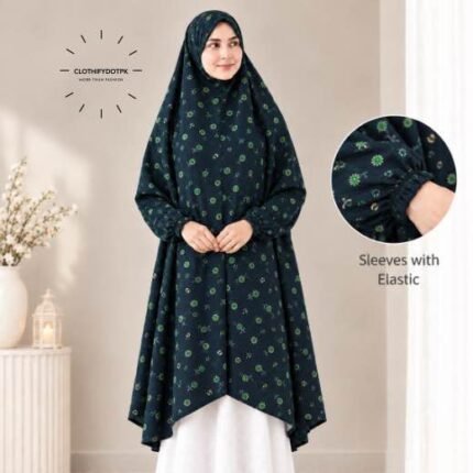 A woman standing for Salah comfortably in a breathable, soft Swiss lawn Namaz Chadar with sleeves- available at CLOTHIFYDOTPK