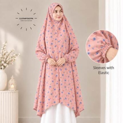 A woman standing for Salah comfortably in a breathable, soft Swiss lawn Namaz Chadar with sleeves- available at CLOTHIFYDOTPK
