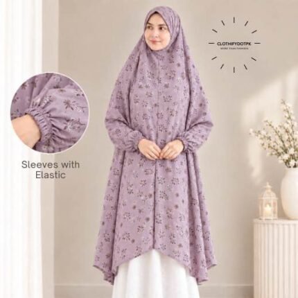 A woman standing for Salah comfortably in a breathable, soft Swiss lawn Namaz Chadar with sleeves- available at CLOTHIFYDOTPK