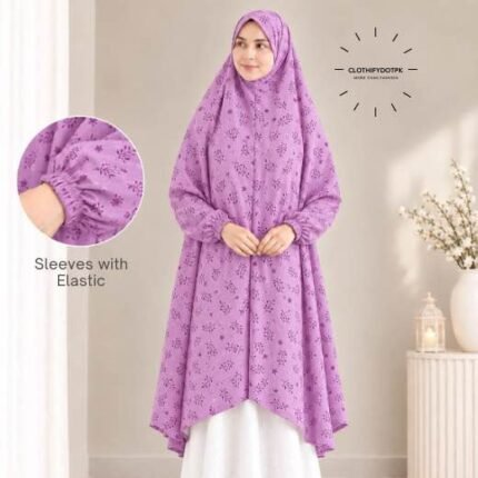 A woman standing for Salah comfortably in a breathable, soft Swiss lawn Namaz Chadar with sleeves- available at CLOTHIFYDOTPK