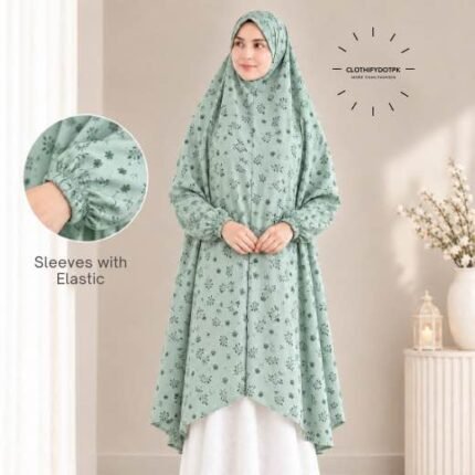 A woman standing for Salah comfortably in a breathable, soft Swiss lawn Namaz Chadar with sleeves- available at CLOTHIFYDOTPK