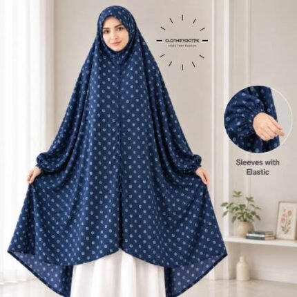 A woman standing for Salah comfortably in a breathable, soft Swiss lawn Namaz Chadar with sleeves- available at CLOTHIFYDOTPK