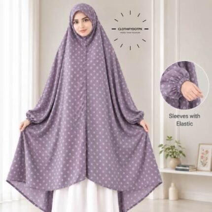 A woman standing for Salah comfortably in a breathable, soft Swiss lawn Namaz Chadar with sleeves- available at CLOTHIFYDOTPK