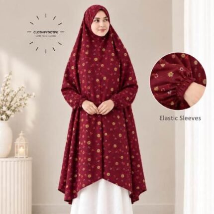 A woman standing for Salah comfortably in a breathable, soft Swiss lawn Namaz Chadar with sleeves- available at CLOTHIFYDOTPK