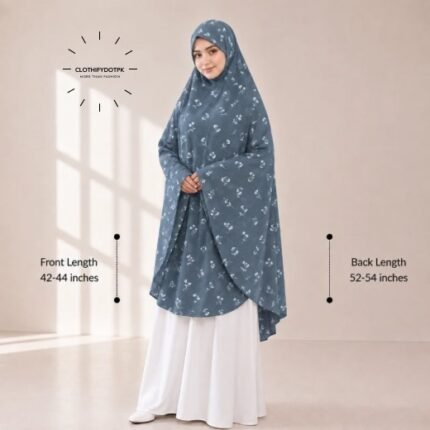 A woman draped in a soft Swiss lawn namaz chadar without sleeves also known as Makhna Hijab or Namaz Scarf with front coverage that falls above the knees, while the back extends down till knees. BY CLOTHIFYDOTPK