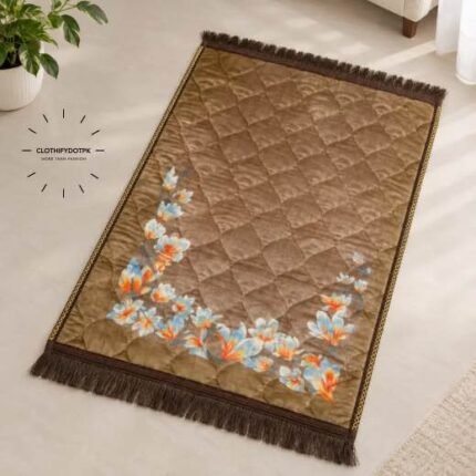 This beautifully designed, quilted prayer mat offers premium padding and is shown flat - courtesy of CLOTHIFYDOTPK.