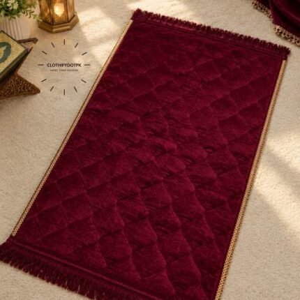 This beautifully designed, quilted prayer mat offers premium padding and is shown flat - courtesy of CLOTHIFYDOTPK.
