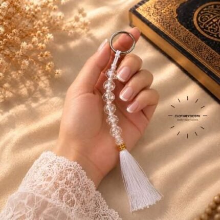 A beautiful tasbeeh made of shimmering clear crystal 7 beads, strung together with a decorative tassel at the end. BY CLOTHIFYDOTPK