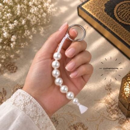 A beautiful tasbeeh made of 7 Pearl beads, strung together. BY CLOTHIFYDOTPK