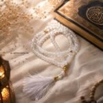 A beautiful tasbeeh made of shimmering clear crystal beads, strung together with a decorative tassel at the end. BY CLOTHIFYDOTPK