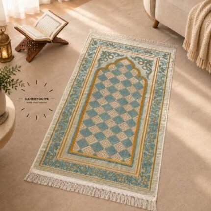 This beautifully designed, Turkish velvet carpet prayer mat offers premium quality and is shown flat - courtesy of CLOTHIFYDOTPK.
