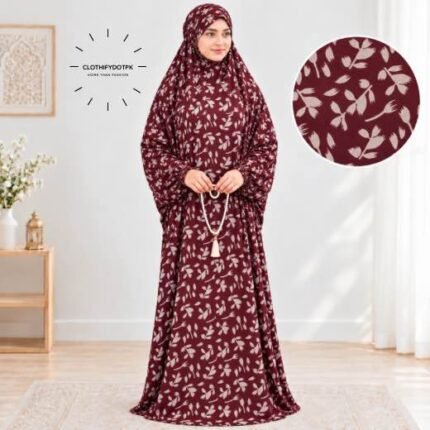 Woman standing wearing printed Saudi style Arabic namaz chadar holding prayer beads full coverage and comfort without compromising style. BY CLOTHIFYDOTPK