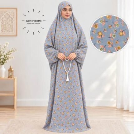 Woman standing wearing printed arabic namaz chadar holding prayer beads full coverage and comfort without compromising style. BY CLOTHIFYDOTPK