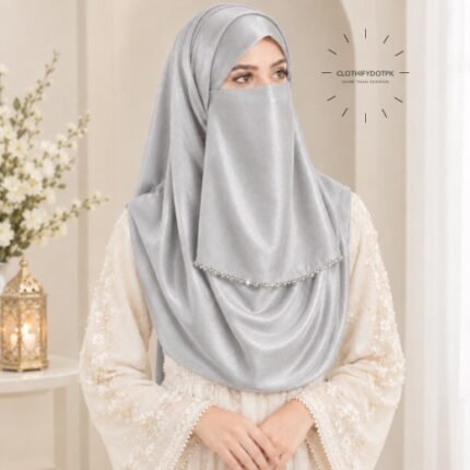 Woman wearing silver color soft crinkle silk hijab with crystal embellished niqab set with beautiful drape and full coverage. BY CLOTHIFYDOTPK