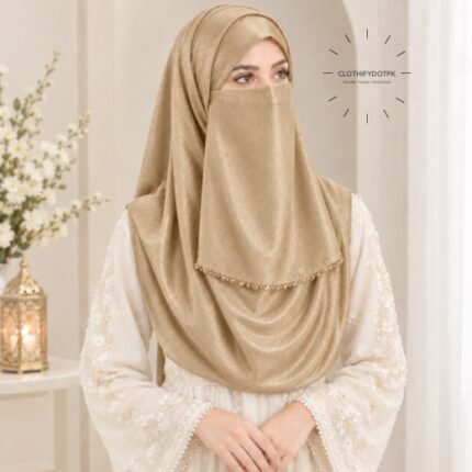 Woman wearing gold color soft crinkle silk hijab with crystal embellished niqab set with beautiful drape and full coverage. BY CLOTHIFYDOTPK