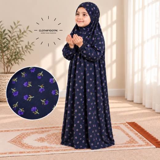Kids Arabic Namaz Chadar (2-4Yrs) - 8 Young child wearing printed Kids Arabic Namaz Chadar with full coverage. BY CLOTHIFYDOTPK