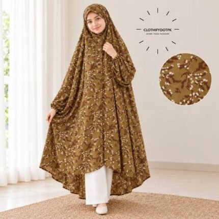 A girl wearing breathable soft swiss lawn modest coverage Kids Namaz Chadar with sleeves. BY CLOTHIFYDOTPK