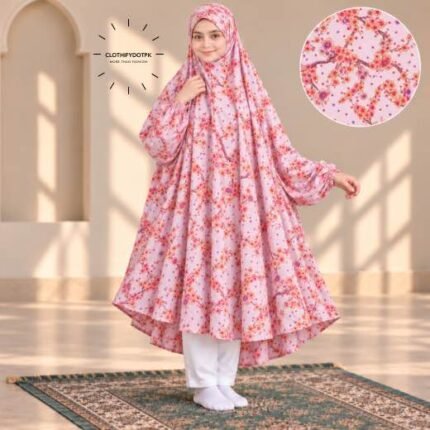 A young girl wearing a soft, Kids Winter Namaz Chadar with sleeves made of breathable warm fabric, sized perfectly for a child | BY CLOTHIFYDOTPK