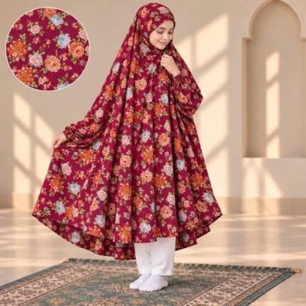 A young girl wearing a soft, Kids Winter Namaz Chadar with sleeves made of breathable warm fabric, sized perfectly for a child | BY CLOTHIFYDOTPK