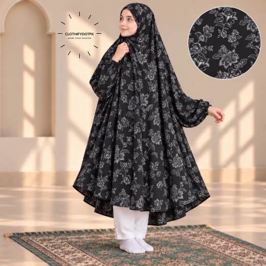 Kids Winter Namaz Chadar (6-9 Yrs) - 14 A young girl wearing a soft, Kids Winter Namaz Chadar with sleeves made of breathable warm fabric, sized perfectly for a child | BY CLOTHIFYDOTPK