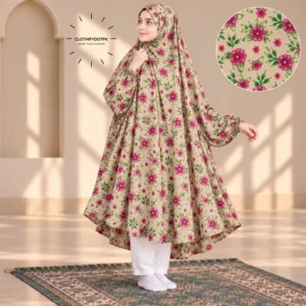 A young girl wearing a soft, Kids Winter Namaz Chadar with sleeves made of breathable warm fabric, sized perfectly for a child | BY CLOTHIFYDOTPK