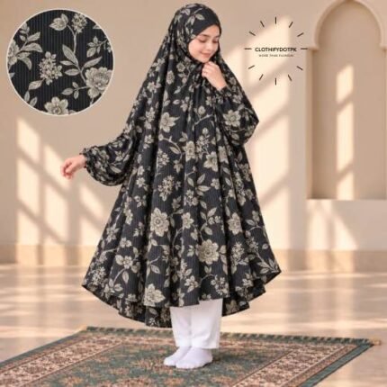 A young girl wearing a soft, Kids Winter Namaz Chadar with sleeves made of breathable warm fabric, sized perfectly for a child | BY CLOTHIFYDOTPK