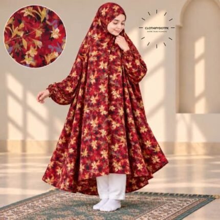 A young girl wearing a soft, Kids Winter Namaz Chadar with sleeves made of breathable warm fabric, sized perfectly for a child | BY CLOTHIFYDOTPK