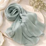 Close-up of Premium Organza Silk Hijab Fabric Texture - Soft Sheer and Breathable. BY CLOTHIFYDOTPK